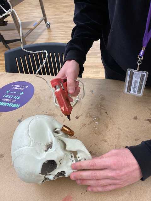 gluing the switch to the back of the skull